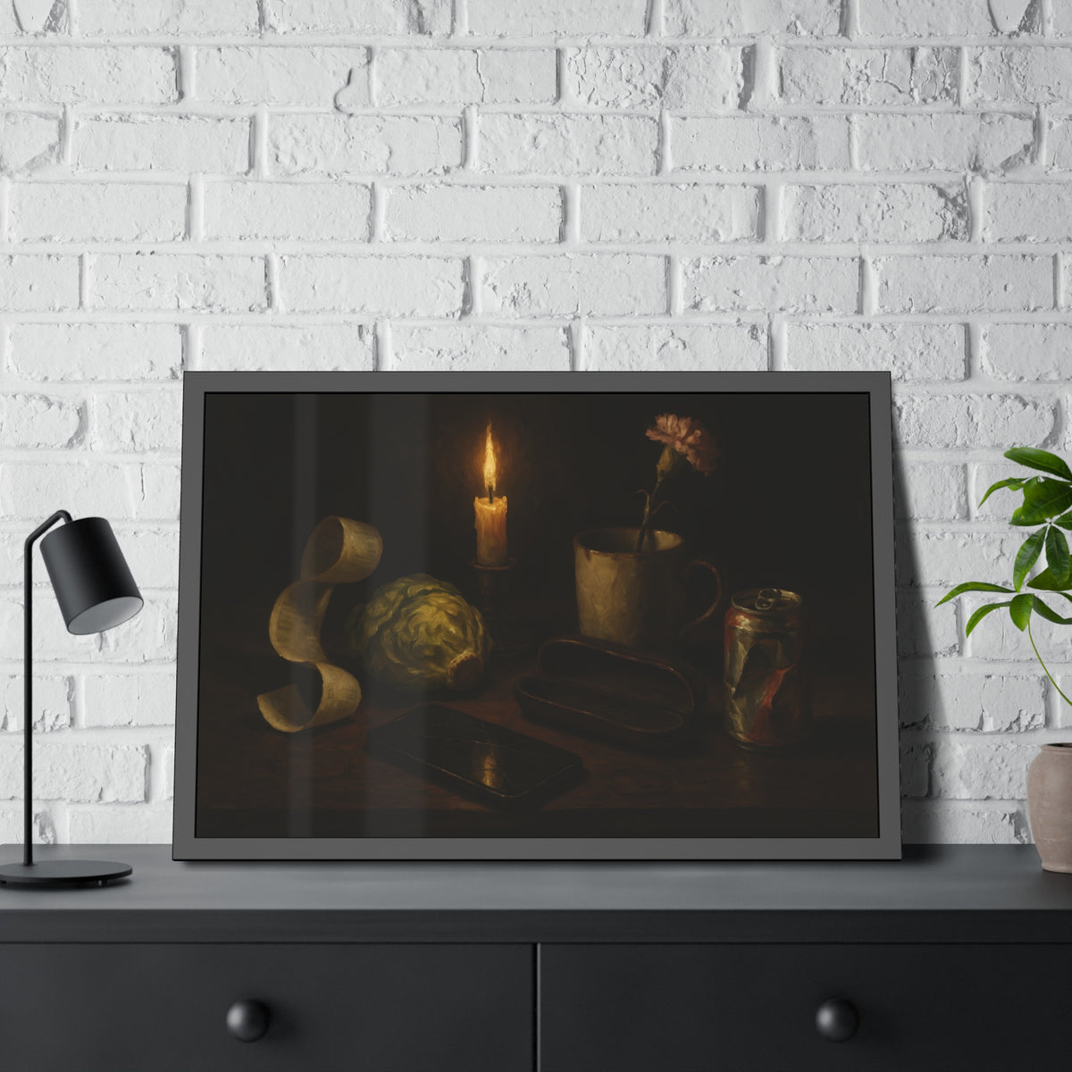 A candle, lettuce head, curled receipt and can on a dim table. Vanitas with Receipts and Wilted Lettuce by Garabaggio, framed fine art print hanging in a room.