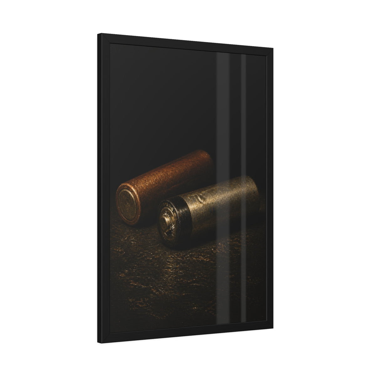 Two spent batteries lying side by side, one rusted, one bare metal. The Second Voice by Garabaggio, framed fine art print hanging in a room.