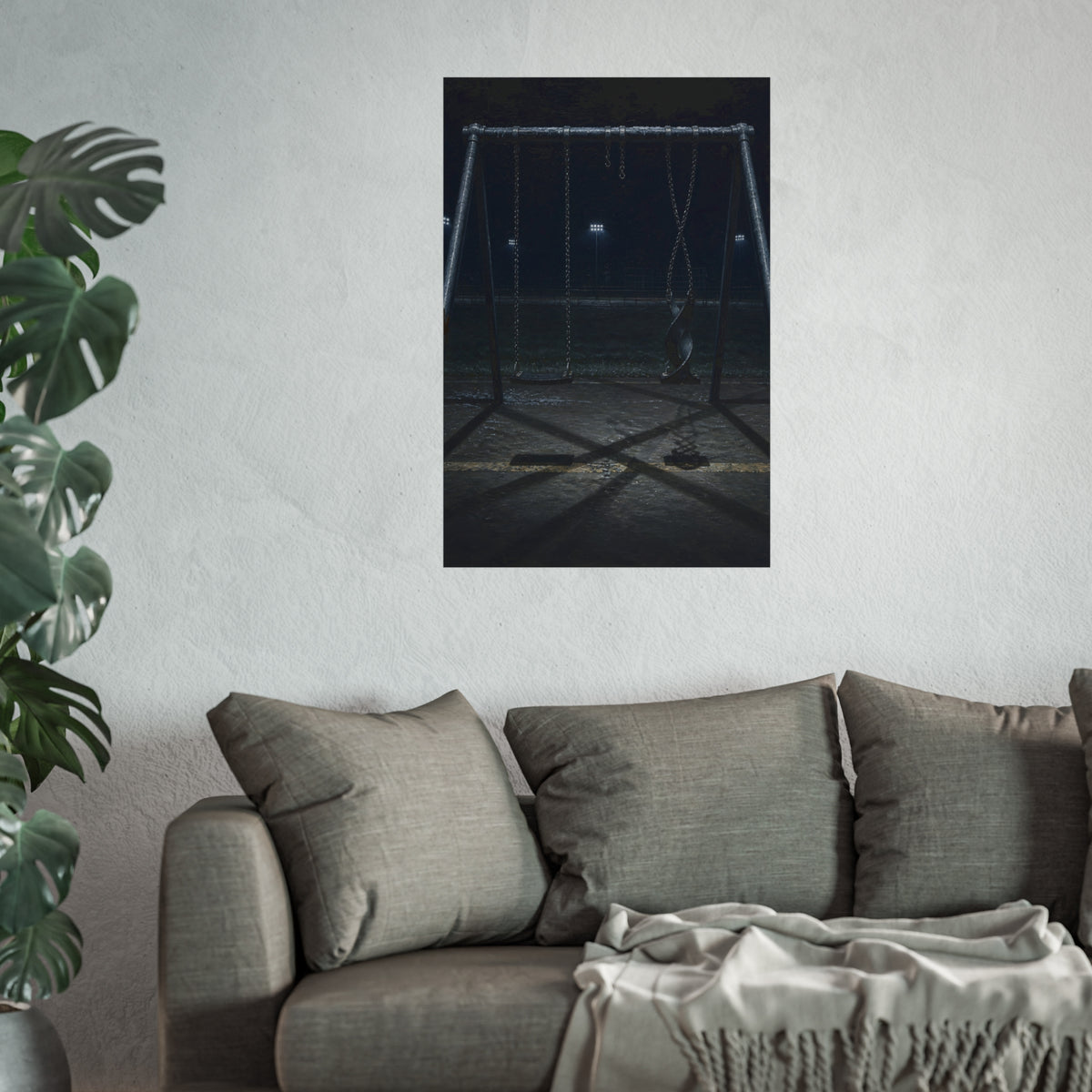 An empty swing set at night with one seat twisted up on its chains. The First Hour: The Twisted Seat by Garabaggio, fine art print hanging in a room.