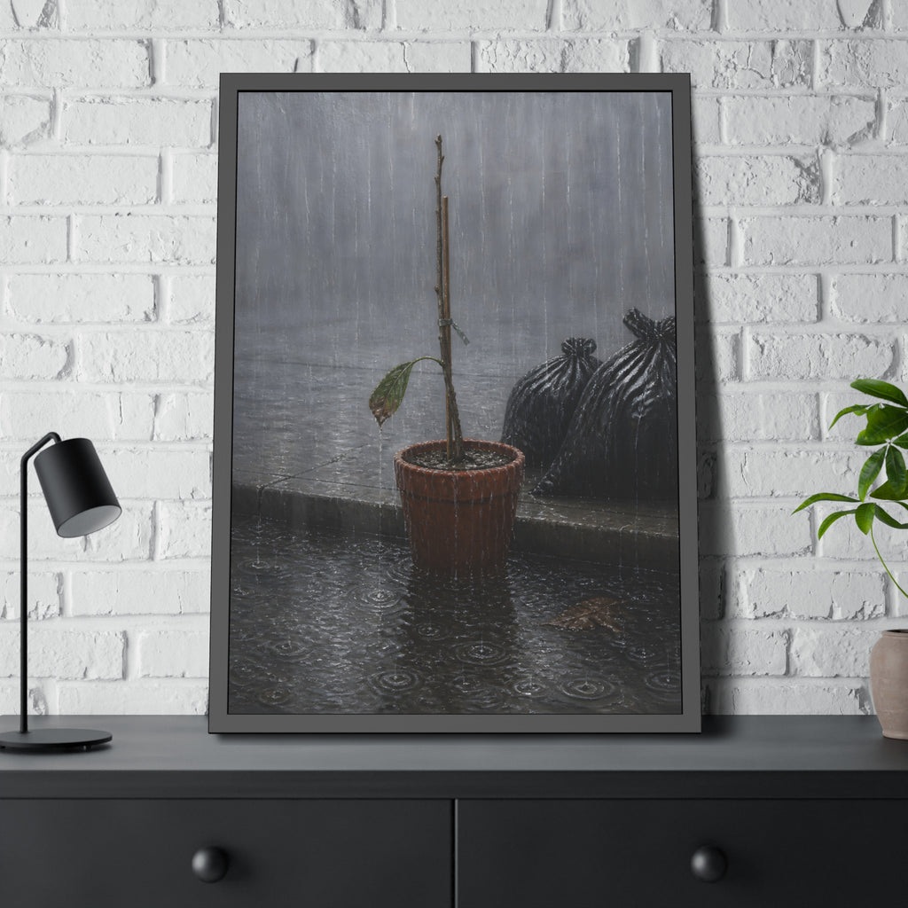A bare stick in a clay pot on a curb in heavy rain beside trash bags. The Second Rain by Garabaggio, framed fine art print hanging in a room.
