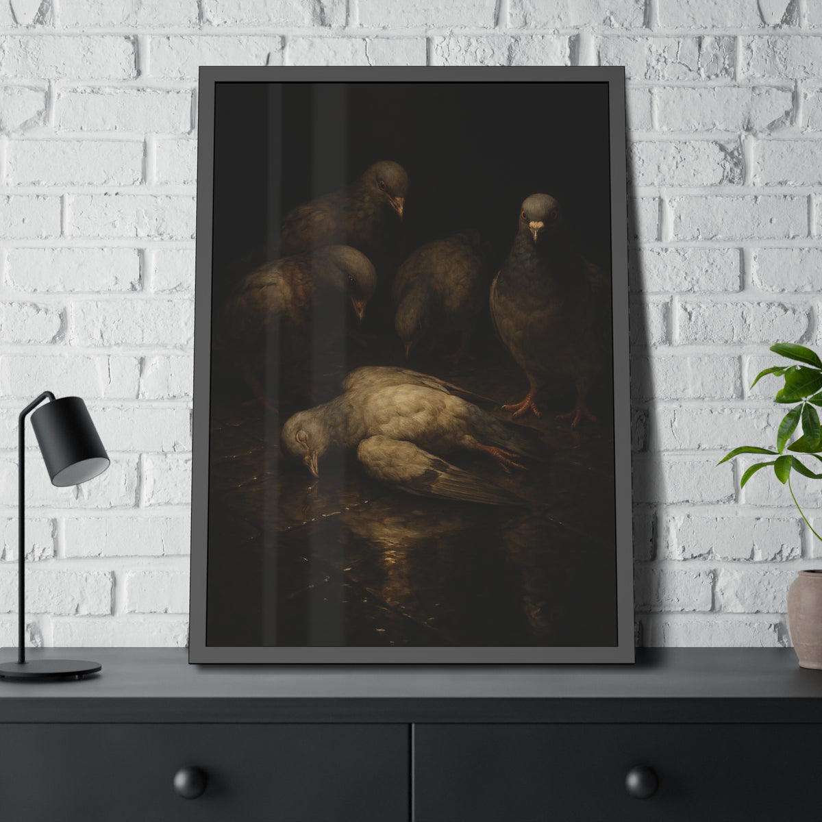 Four pigeons standing over a dead pigeon on wet pavement. The Lamentation by Garabaggio, framed fine art print hanging in a room.