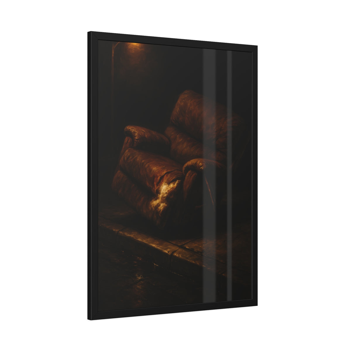 A torn brown recliner tipped on a curb in dim warm light. The Deposition of the Broken Recliner by Garabaggio, framed fine art print hanging in a room.