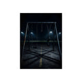 An empty swing set at night with field lights glowing behind it. The Ninth Hour: The Seat Still Moving by Garabaggio, fine art print, 12″ x 16″.