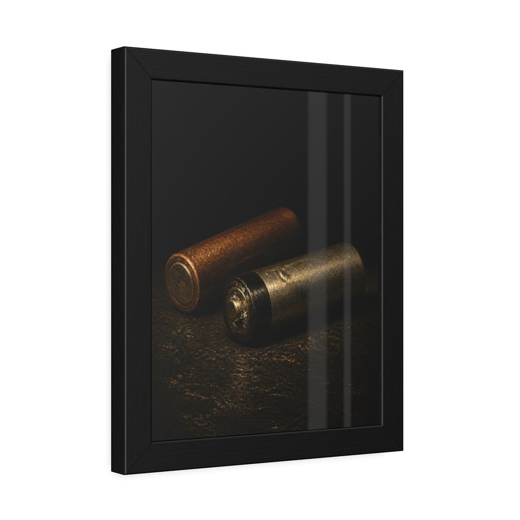 Two spent batteries lying side by side, one rusted, one bare metal. The Second Voice by Garabaggio, framed fine art print hanging in a room.