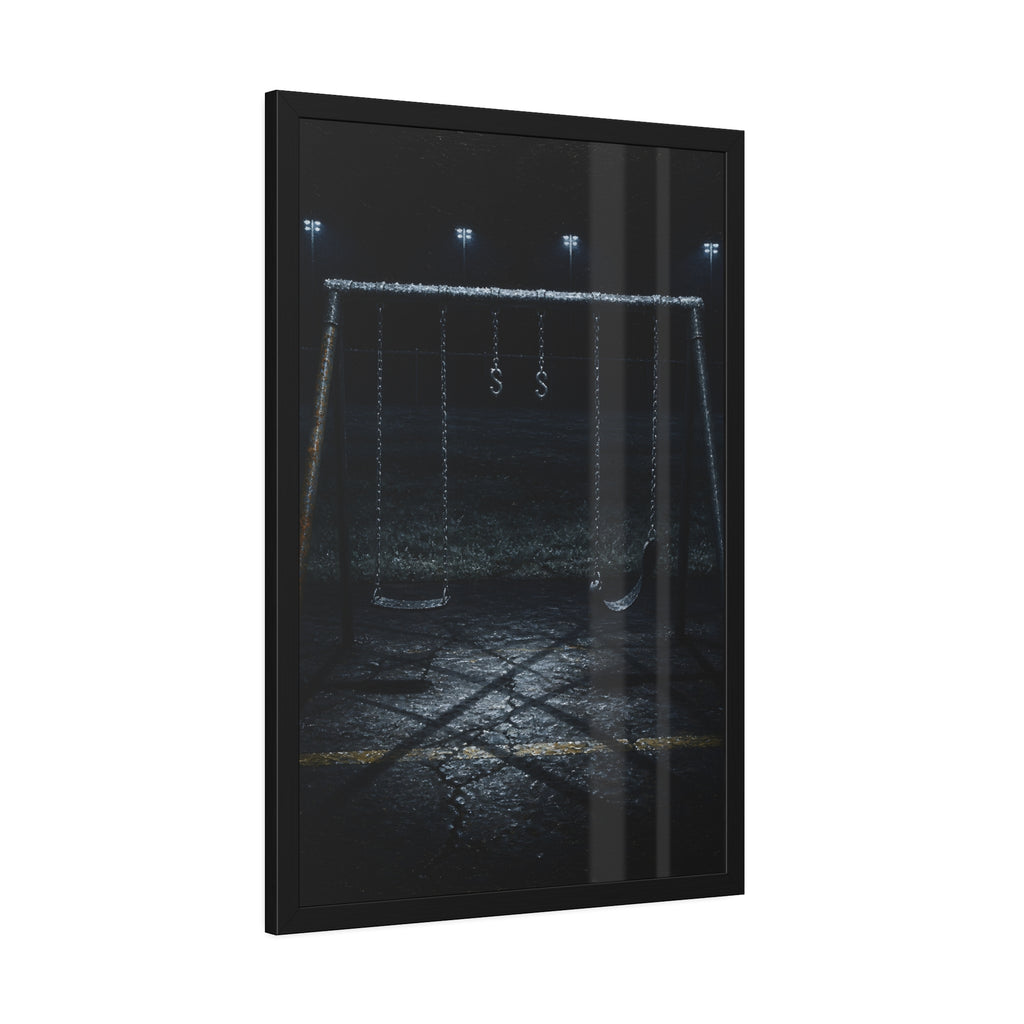 An empty swing set with frost on its crossbar under floodlights. Midnight: The Frost on the Crossbar by Garabaggio, framed fine art print hanging in a room.