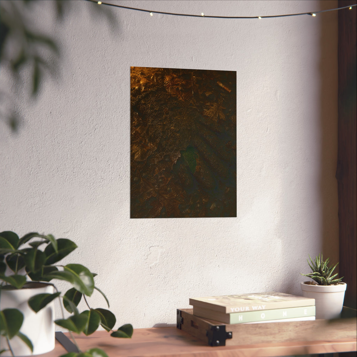 Wet mud and pressed oak leaves with a green scrap barely showing. The Reliquary of Mud and Leaf by Garabaggio, fine art print hanging in a room.