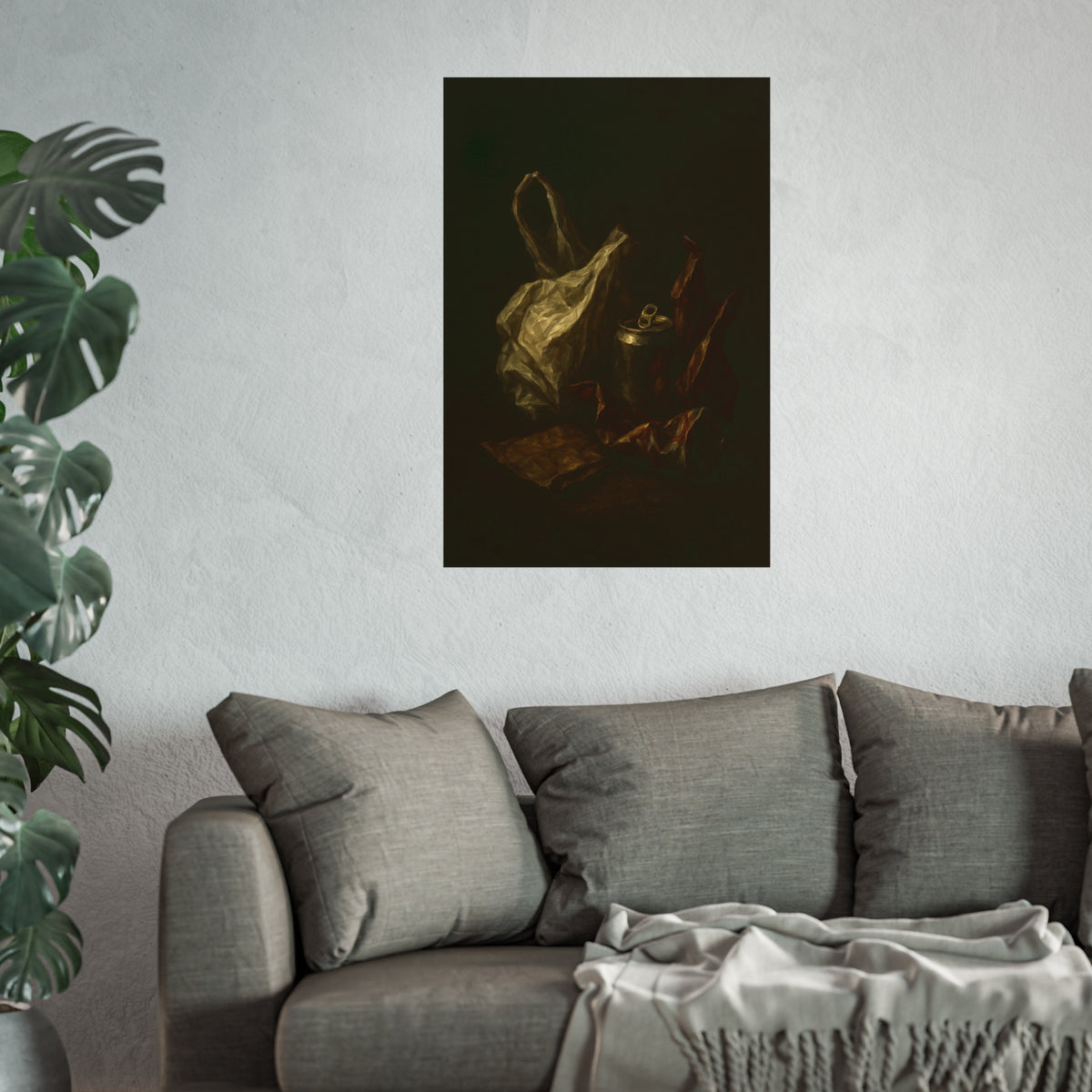 A crumpled plastic bag, crushed can and foil wrappers on a dark table. The Pietà of the Deflated by Garabaggio, fine art print hanging in a room.