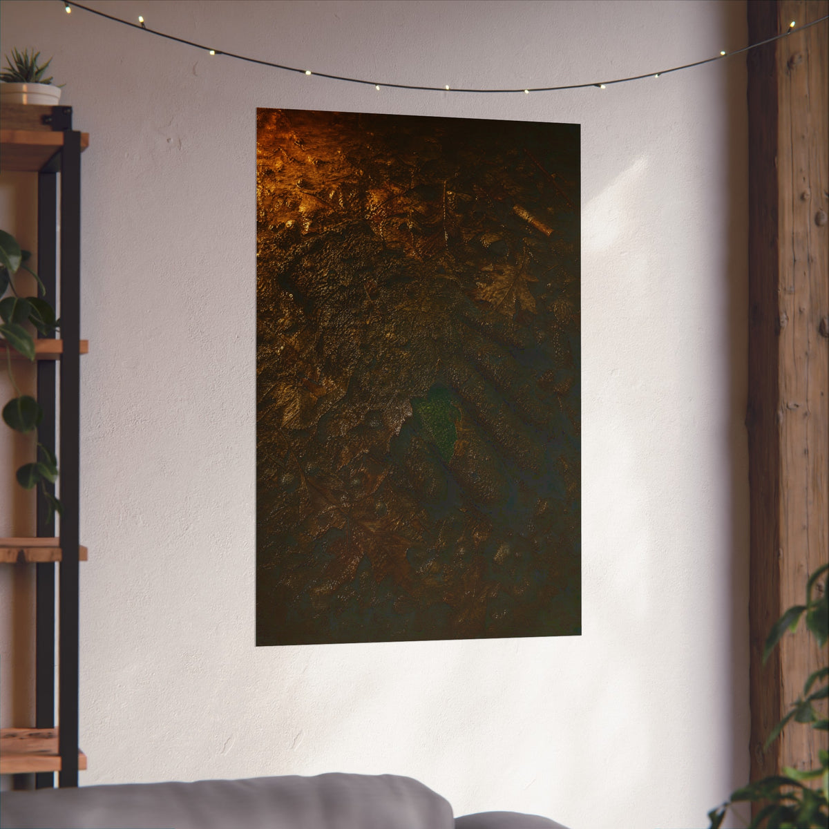 Wet mud and pressed oak leaves with a green scrap barely showing. The Reliquary of Mud and Leaf by Garabaggio, fine art print hanging in a room.