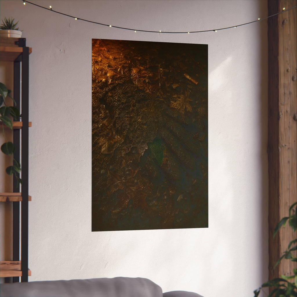 Wet mud and pressed oak leaves with a green scrap barely showing. The Reliquary of Mud and Leaf by Garabaggio, fine art print hanging in a room.