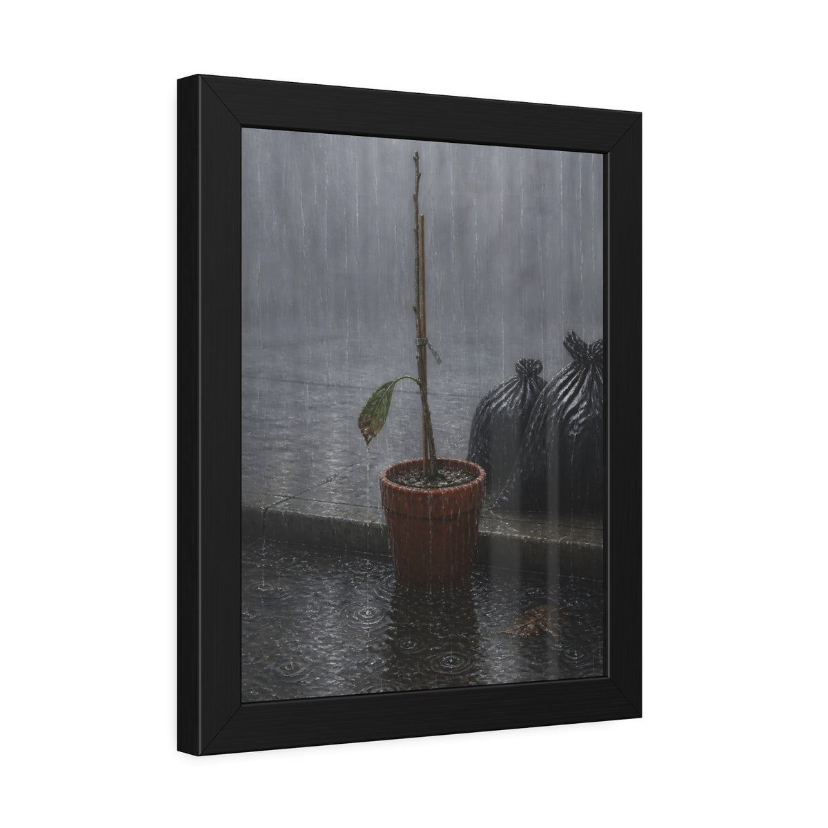 A bare stick in a clay pot on a curb in heavy rain beside trash bags. The Second Rain by Garabaggio, framed fine art print hanging in a room.