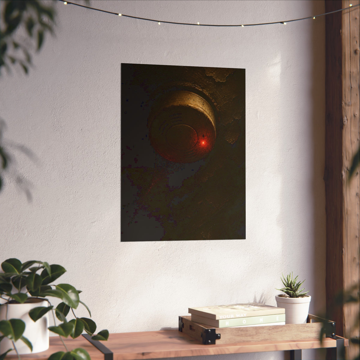 A dusty smoke detector on a peeling ceiling with its red light on. The First Red Blink by Garabaggio, fine art print hanging in a room.