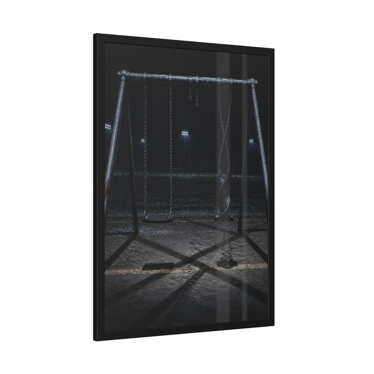 An empty swing set at night with one seat twisted up on its chains. The First Hour: The Twisted Seat by Garabaggio, framed fine art print hanging in a room.