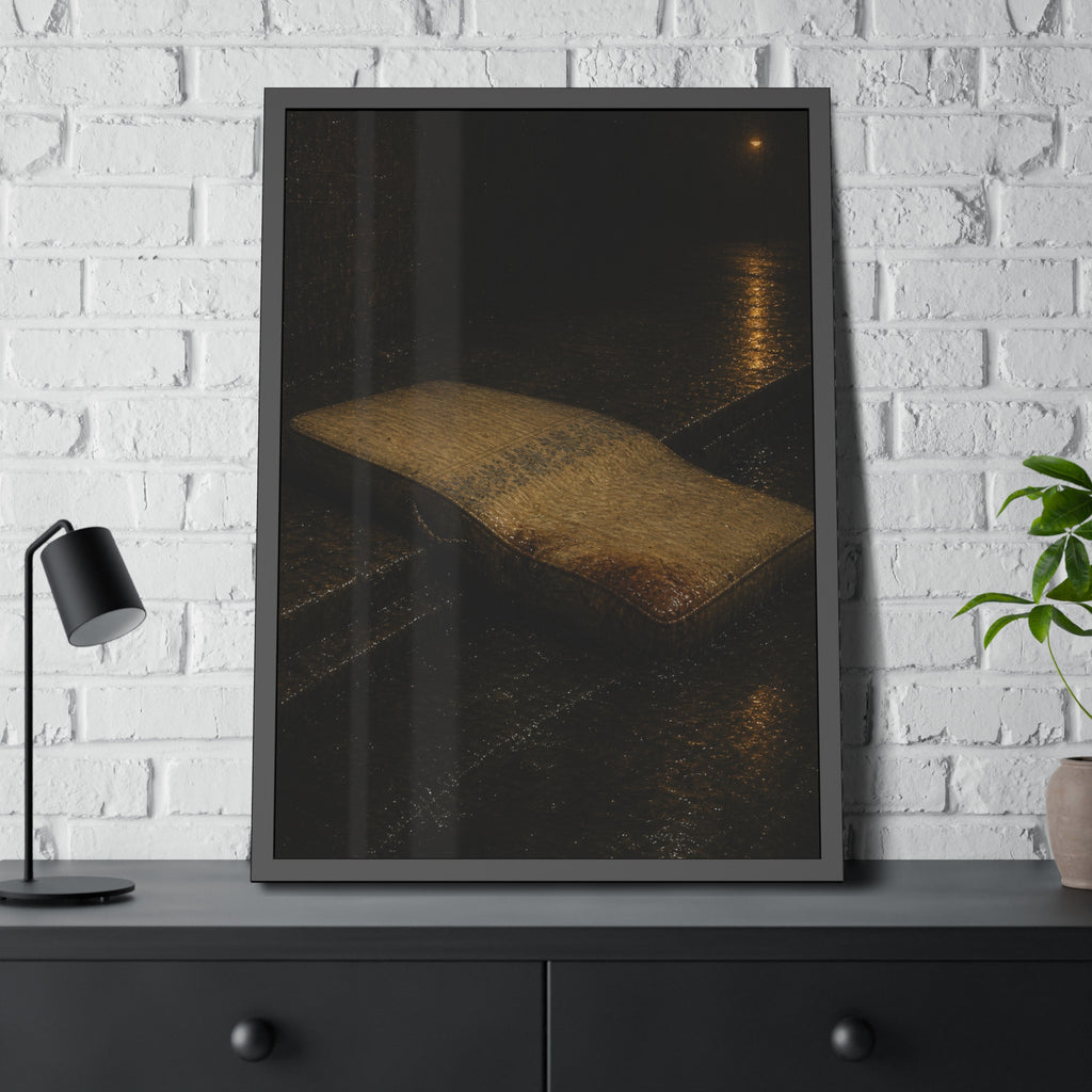 A sodden mattress slumped off a curb on wet pavement under a street lamp. The Collapse into the Gutter by Garabaggio, framed fine art print hanging in a room.