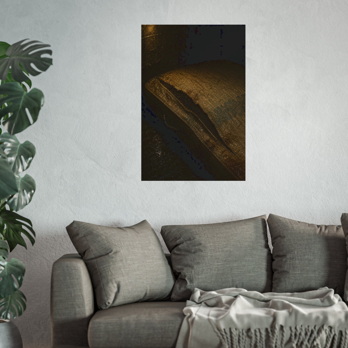 A mattress with its seam split open, lit warm against a dark wall. The Opening of the Ticking by Garabaggio, fine art print hanging in a room.