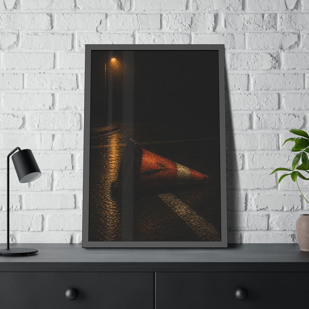 A toppled orange traffic cone on a wet road under a lone streetlight. The Taking by the Bumper by Garabaggio, framed fine art print hanging in a room.