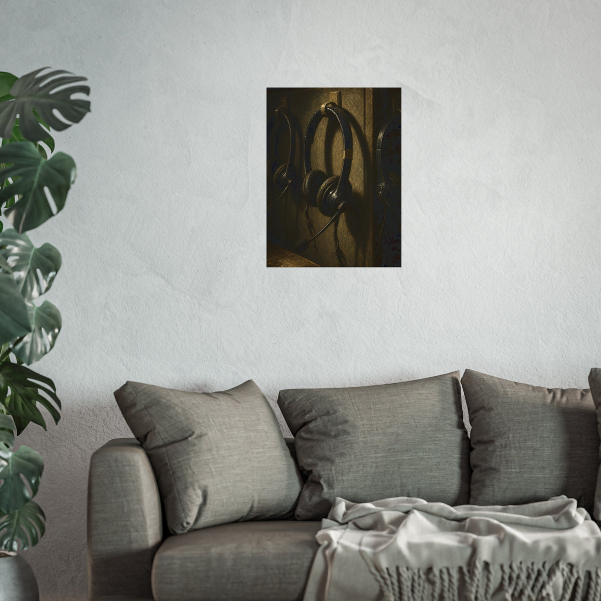 Three worn call center headsets hanging on wall hooks in dim light. The Headsets Left Hanging by Garabaggio, fine art print hanging in a room.