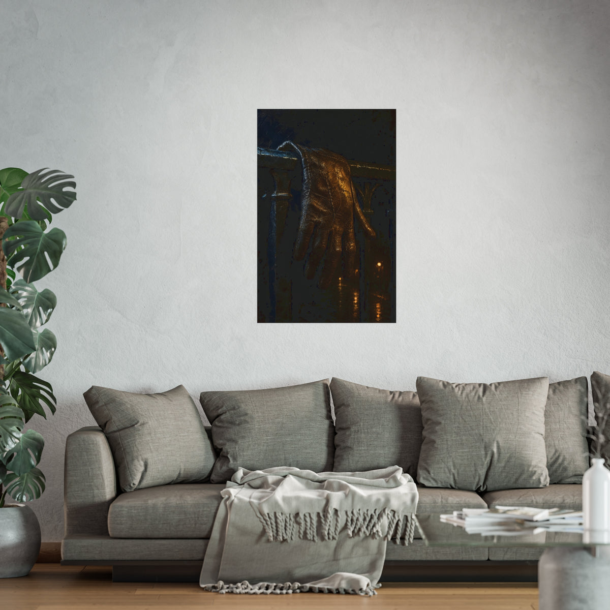 A leather glove draped over an iron railing, fingers hanging. The Repose of the Leather Glove, No. 1 by Garabaggio, fine art print hanging in a room.