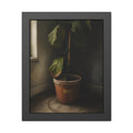 A leafy potted fig staked to a cane in a taped clay pot beside a window. The Corner by the Window by Garabaggio, framed fine art print, 11″ x 14″.