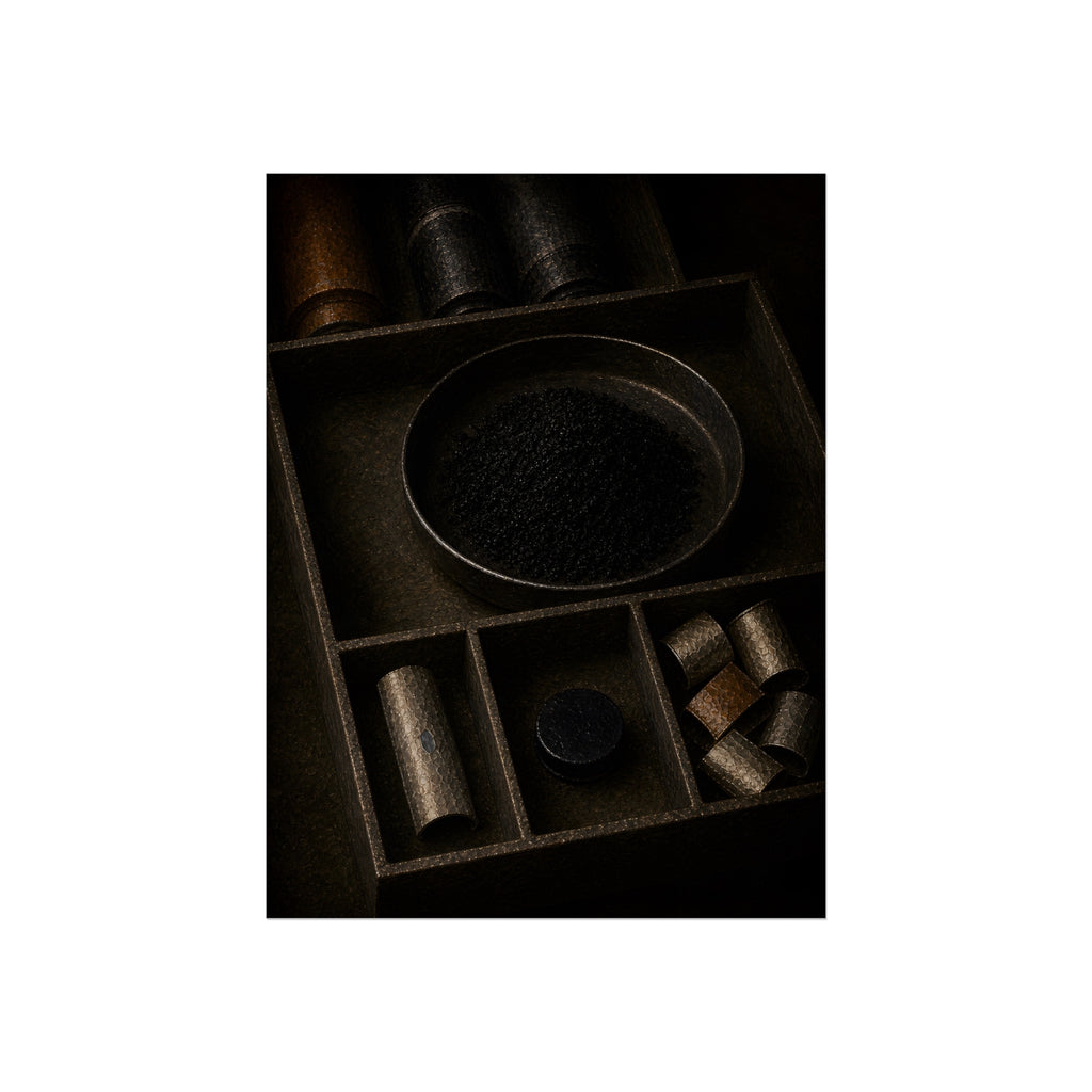 Battery casings and black powder sorted into the trays of a dim box. The Black Recovery by Garabaggio, fine art print, 12″ x 16″.