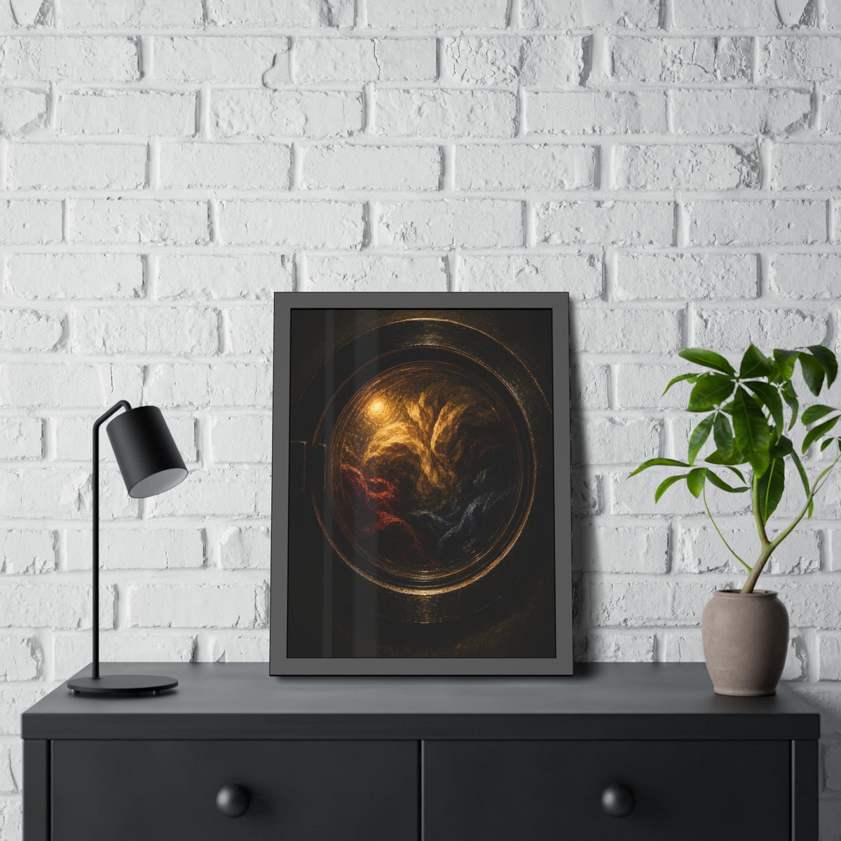 Colored laundry tumbling behind a round washer window in the dark. The Rose Window Turning by Garabaggio, framed fine art print hanging in a room.
