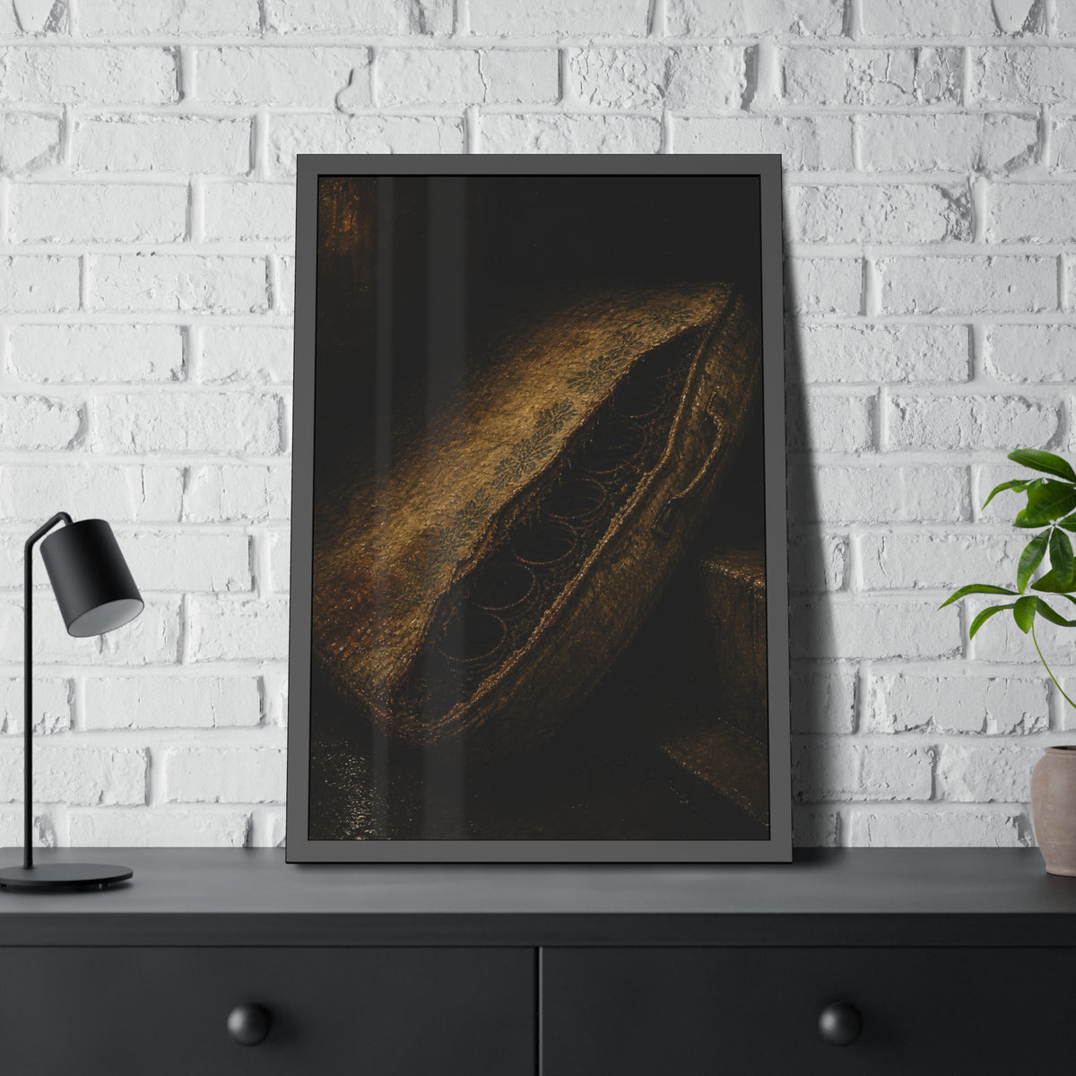 A torn mattress propped on its side, coil springs showing through the split. The Showing of the Springs by Garabaggio, framed fine art print hanging in a room.