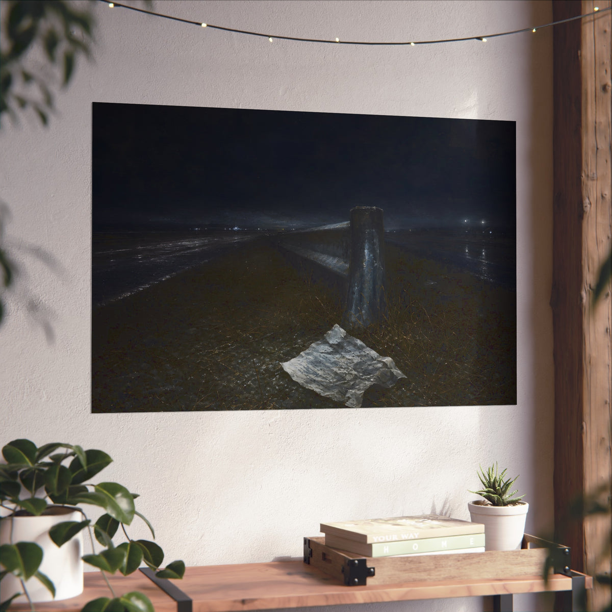 A sheet of paper on a grassy highway median beside a concrete post at night. The Resume on the Median by Garabaggio, fine art print hanging in a room.
