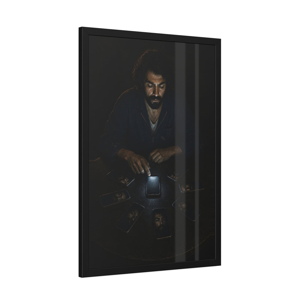 A bearded man at a dark table ringed by phones, one lit screen under his hand. The Congregation of Faces by Garabaggio, framed fine art print hanging in a room.