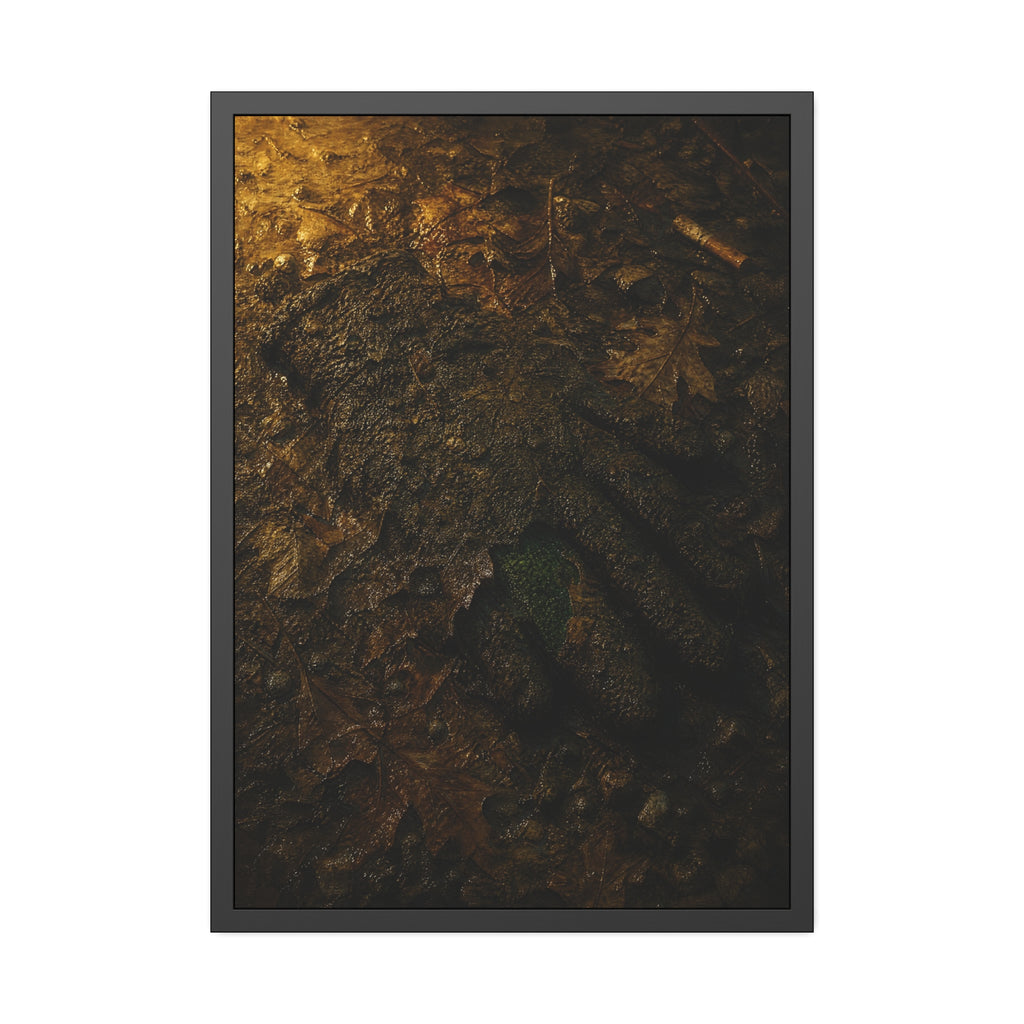 Wet mud and pressed oak leaves with a green scrap barely showing. The Reliquary of Mud and Leaf by Garabaggio, framed fine art print hanging in a room.