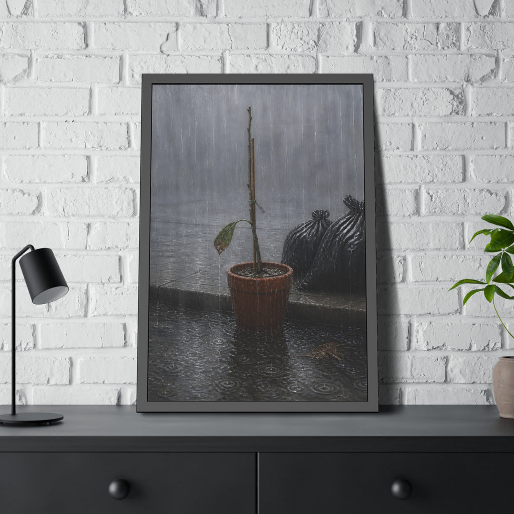 A bare stick in a clay pot on a curb in heavy rain beside trash bags. The Second Rain by Garabaggio, framed fine art print hanging in a room.
