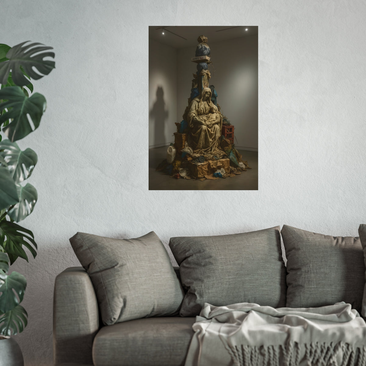Seated hooded figure cradling a bundle on a mound of bagged refuse. Pietà of the Curbside by Garabaggio, fine art print hanging in a room.