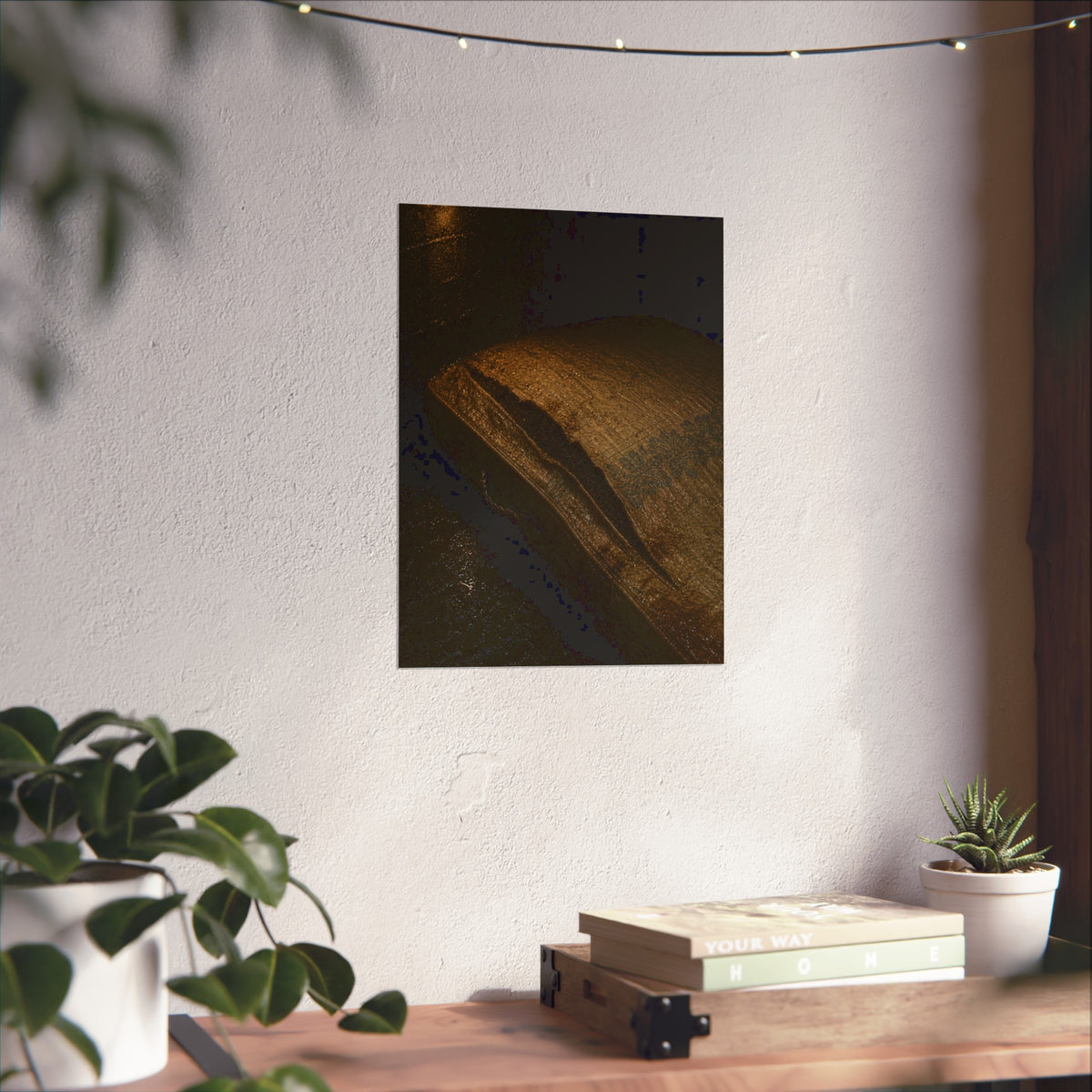 A mattress with its seam split open, lit warm against a dark wall. The Opening of the Ticking by Garabaggio, fine art print hanging in a room.