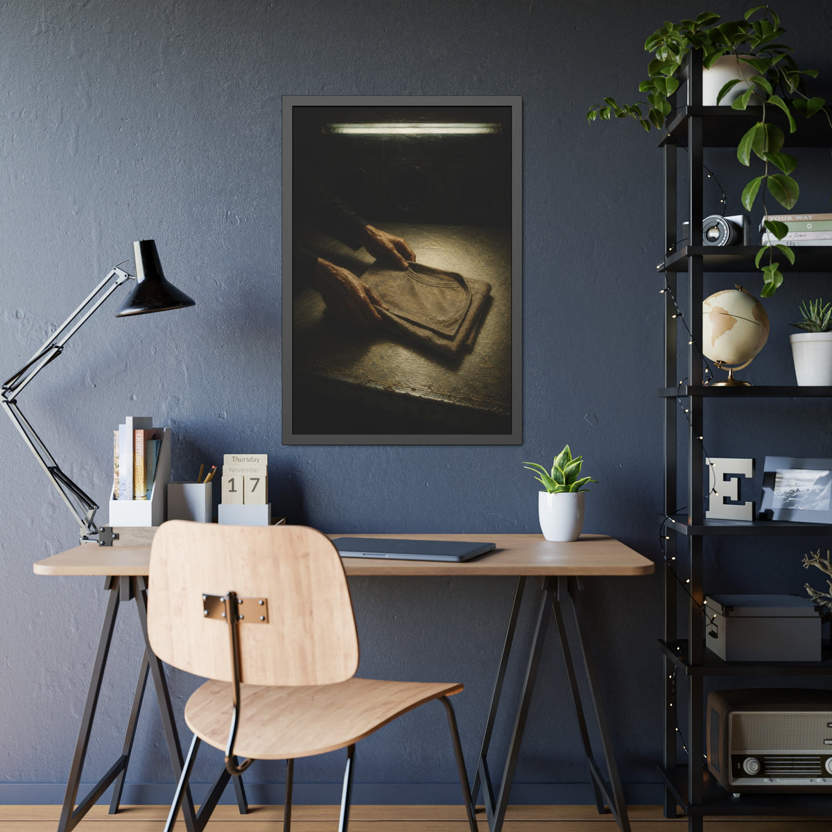 Two hands folding a shirt on a laundromat table with washers behind. The Folding at Two A.M by Garabaggio, framed fine art print hanging in a room.