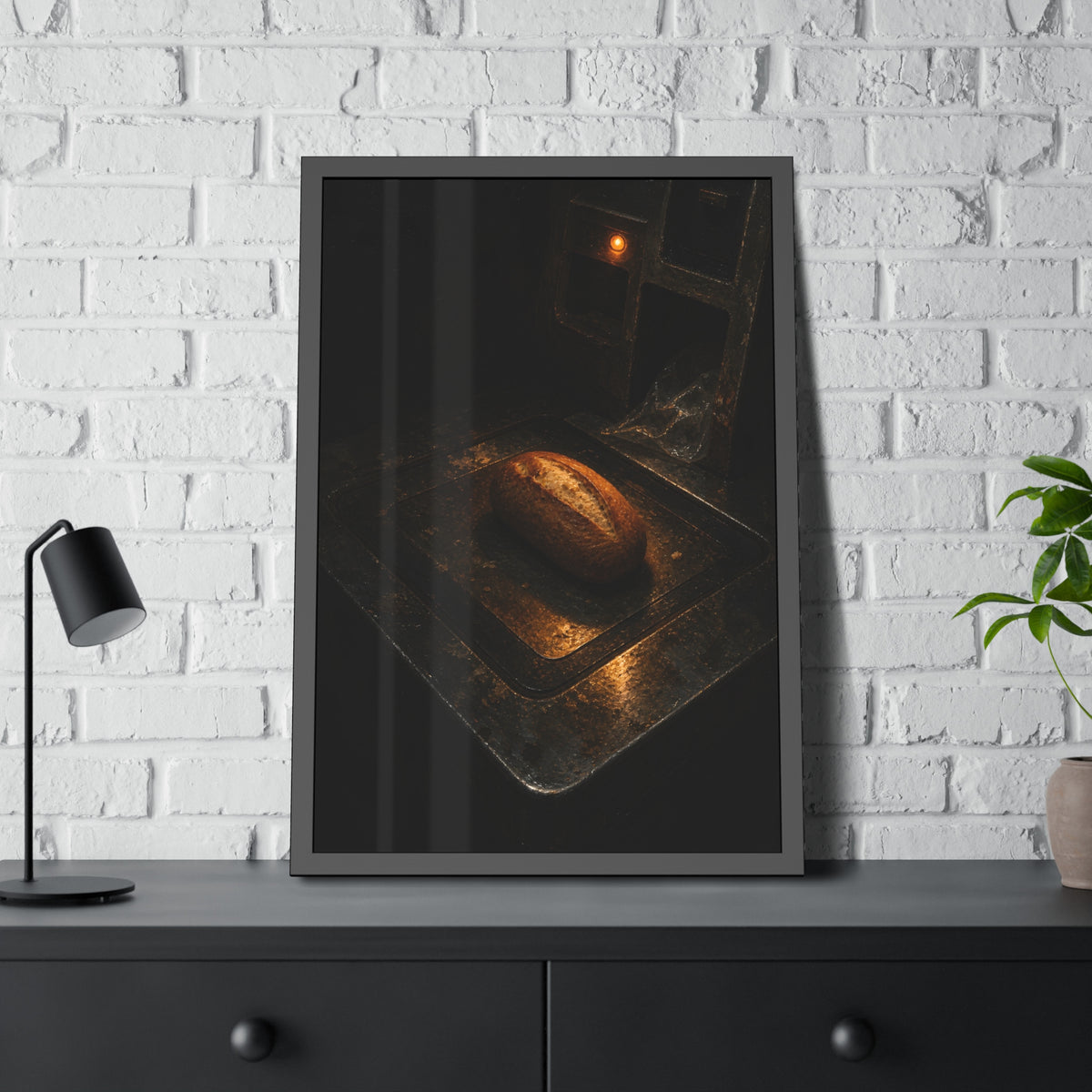A loaf of bread alone on a dark self checkout weighing plate. The Witness at the Scale by Garabaggio, framed fine art print hanging in a room.