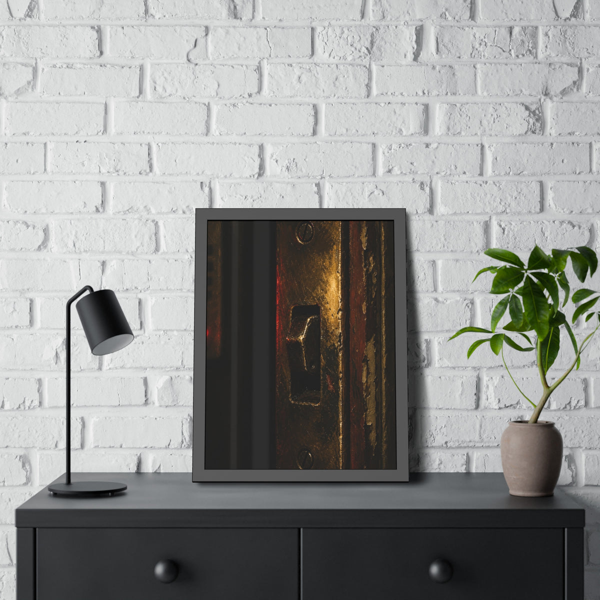 A brass door latch beside an intercom with a small red light. The Door Does Not Release by Garabaggio, framed fine art print hanging in a room.