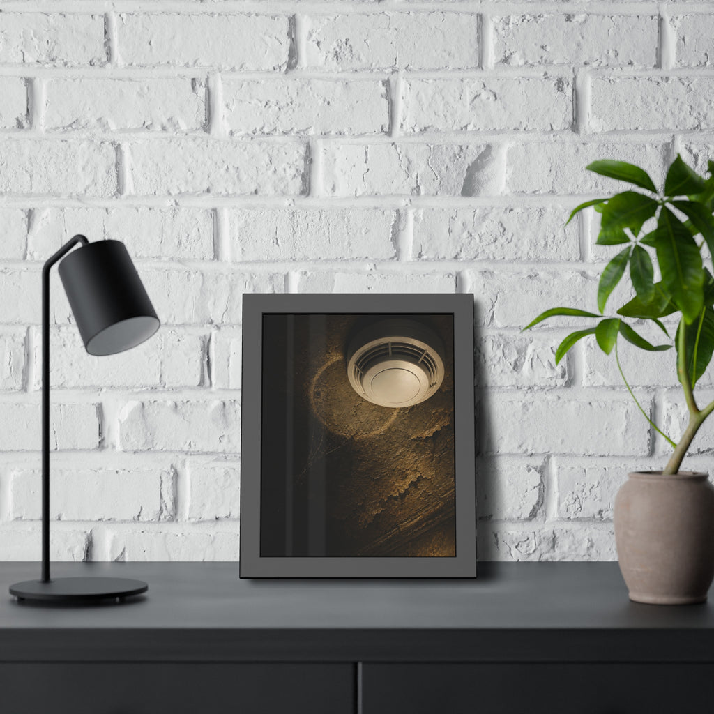 A new smoke detector on a stained ceiling next to an old mounting ring. The New Detector by Garabaggio, framed fine art print hanging in a room.