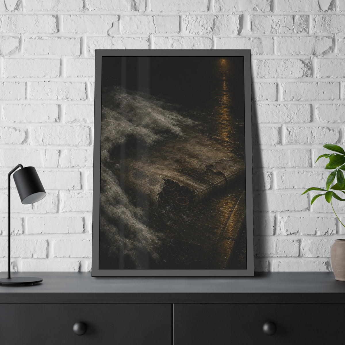 A soaked mattress in melting snow at the curb beside a wet street. The Thaw by Garabaggio, framed fine art print hanging in a room.