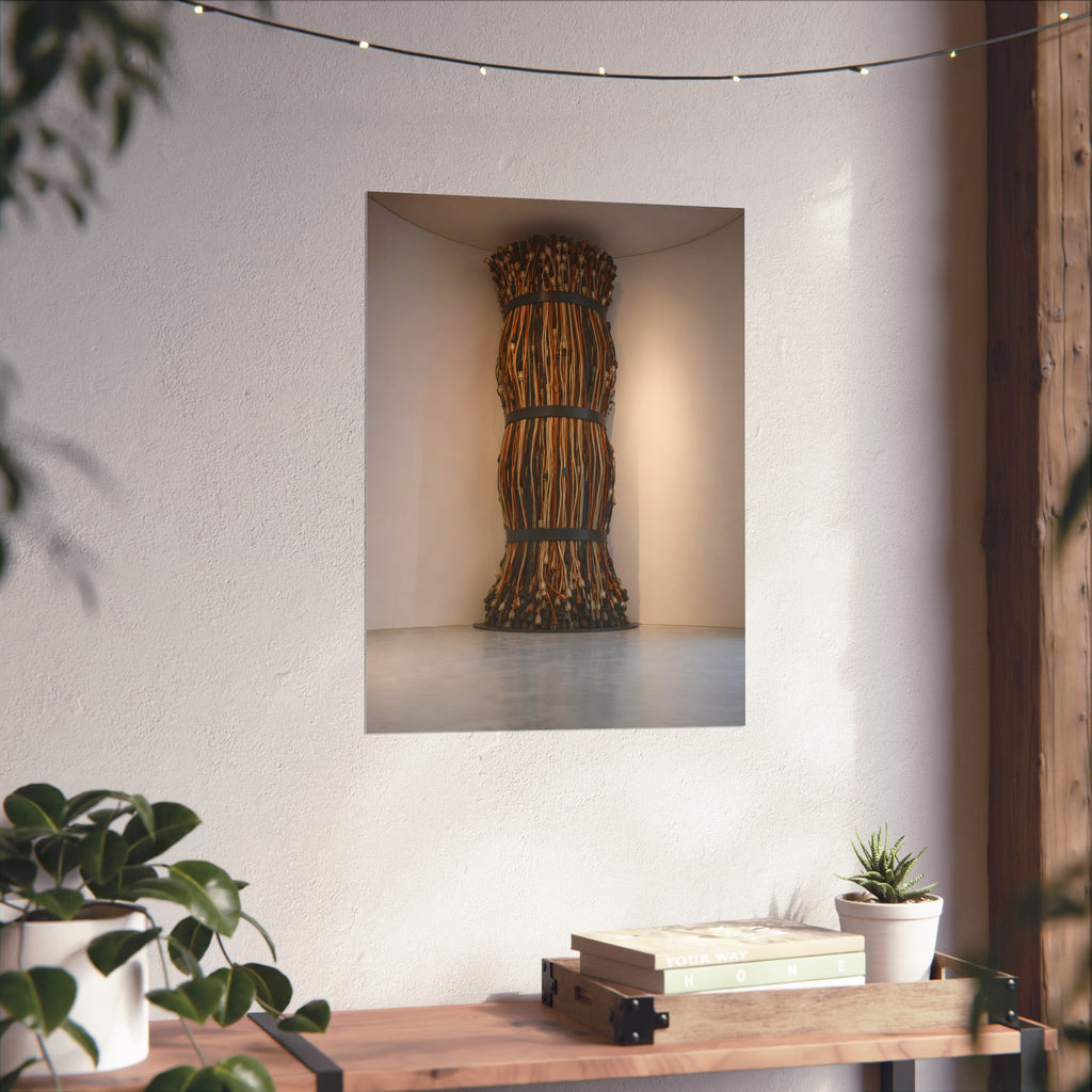 A tall column of bundled cords strapped in three places in a gallery corner. The Bundled Apse by Garabaggio, fine art print hanging in a room.