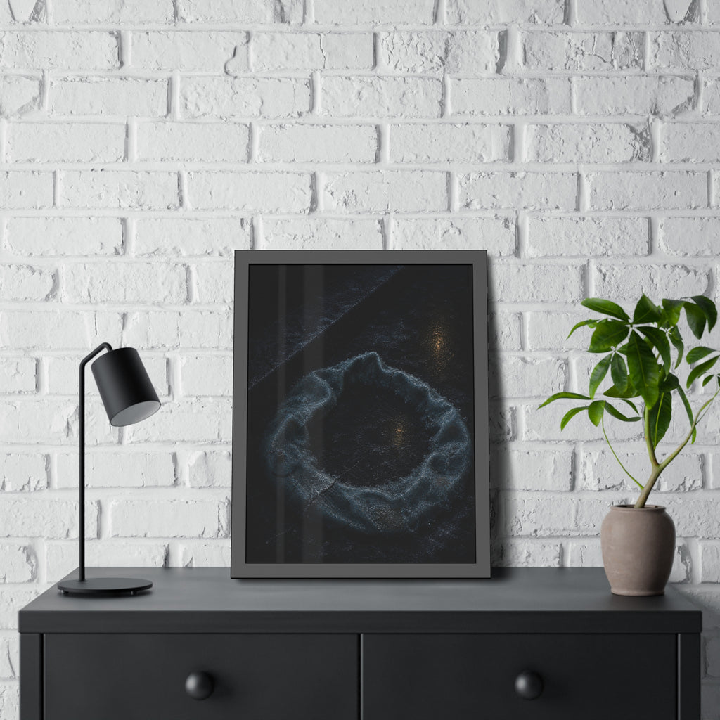 A deflated ring float collapsed on wet pavement under distant amber light. The Freezing of the Smile by Garabaggio, framed fine art print hanging in a room.