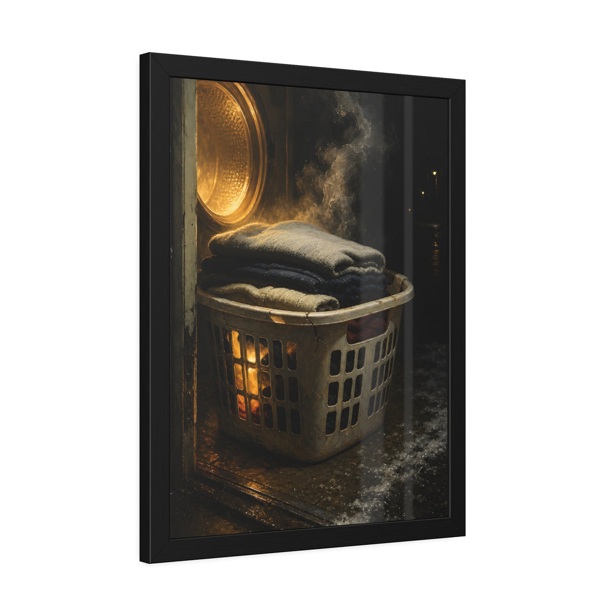 A laundry basket of folded clothes glowing in front of an open dryer. The Warm Clothes Against the Cold by Garabaggio, framed fine art print hanging in a room.