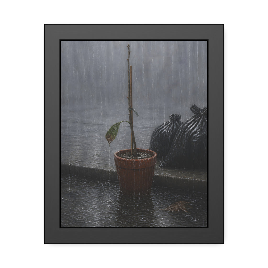 A bare stick in a clay pot on a curb in heavy rain beside trash bags. The Second Rain by Garabaggio, framed fine art print, 11″ x 14″.