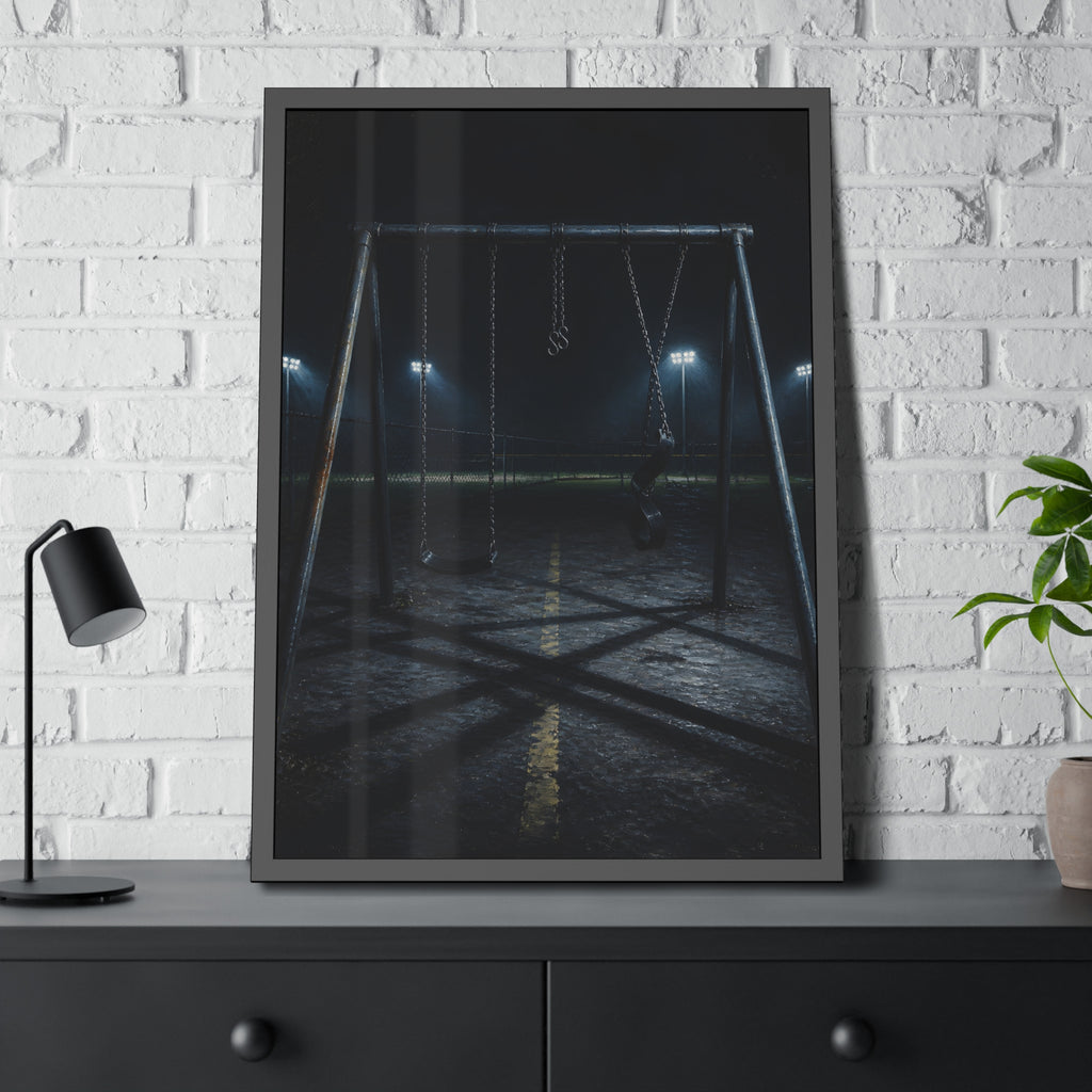 An empty swing set at night with field lights glowing behind it. The Ninth Hour: The Seat Still Moving by Garabaggio, framed fine art print hanging in a room.