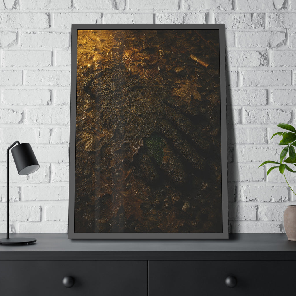 Wet mud and pressed oak leaves with a green scrap barely showing. The Reliquary of Mud and Leaf by Garabaggio, framed fine art print hanging in a room.