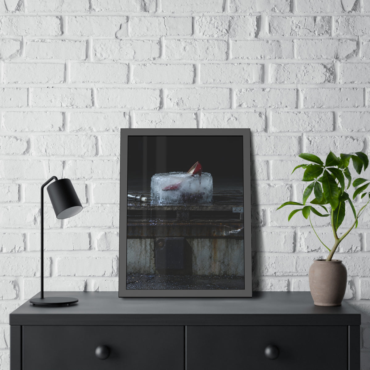 "The Red Heel Standing Out": A Garabaggio Framed Print