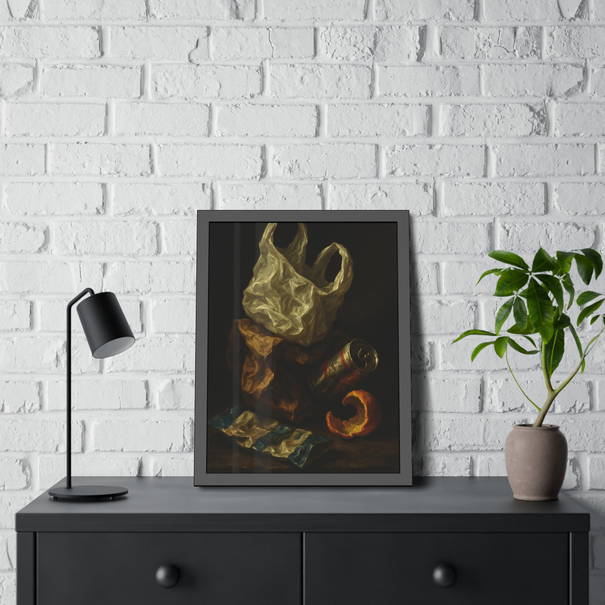 A plastic bag, crushed can and orange peel on a dim table. Still Life with Orange Peel and Resignation by Garabaggio, framed fine art print hanging in a room.