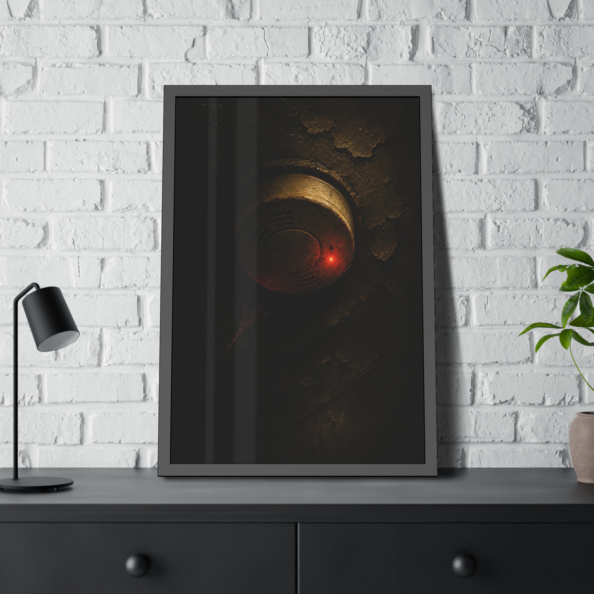 A dusty smoke detector on a peeling ceiling with its red light on. The First Red Blink by Garabaggio, framed fine art print hanging in a room.