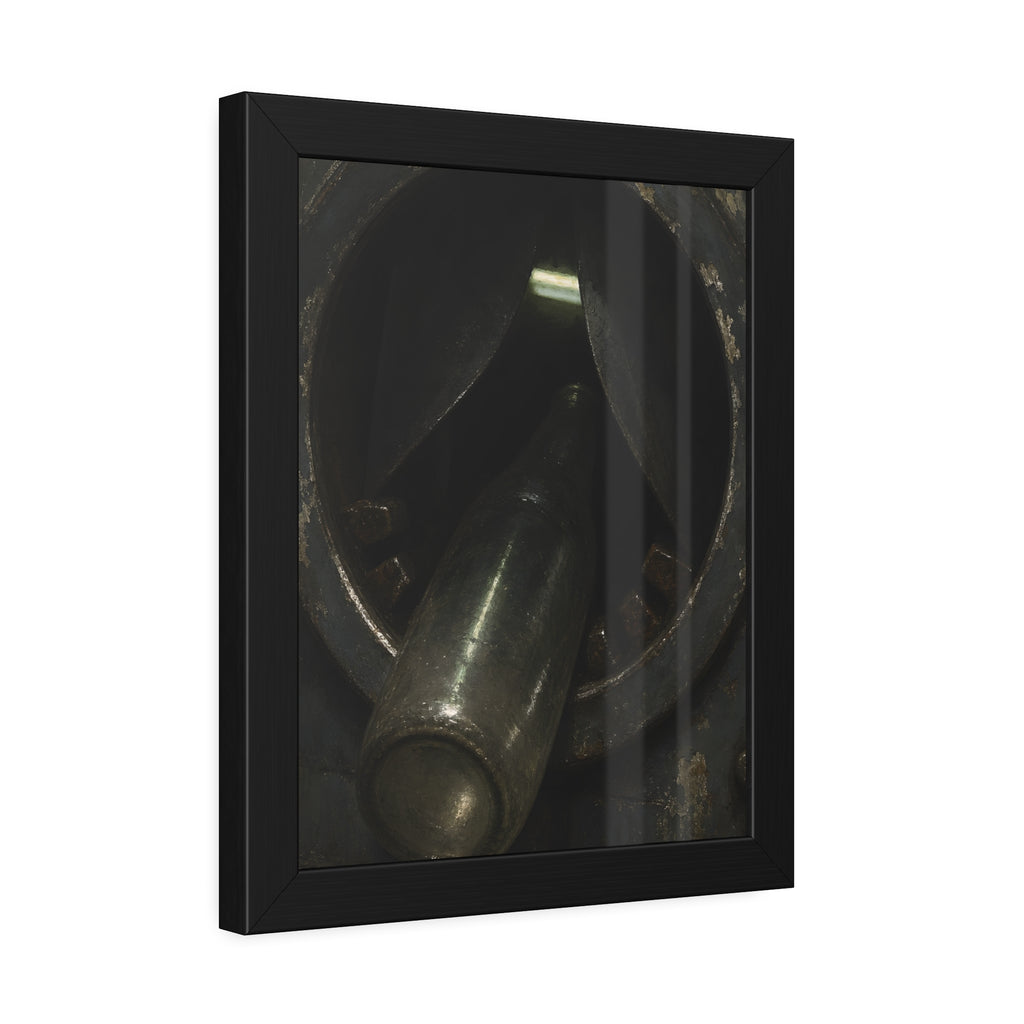 A glass bottle wedged in the round steel intake of a crushing machine. The Crusher's Mouth by Garabaggio, framed fine art print hanging in a room.