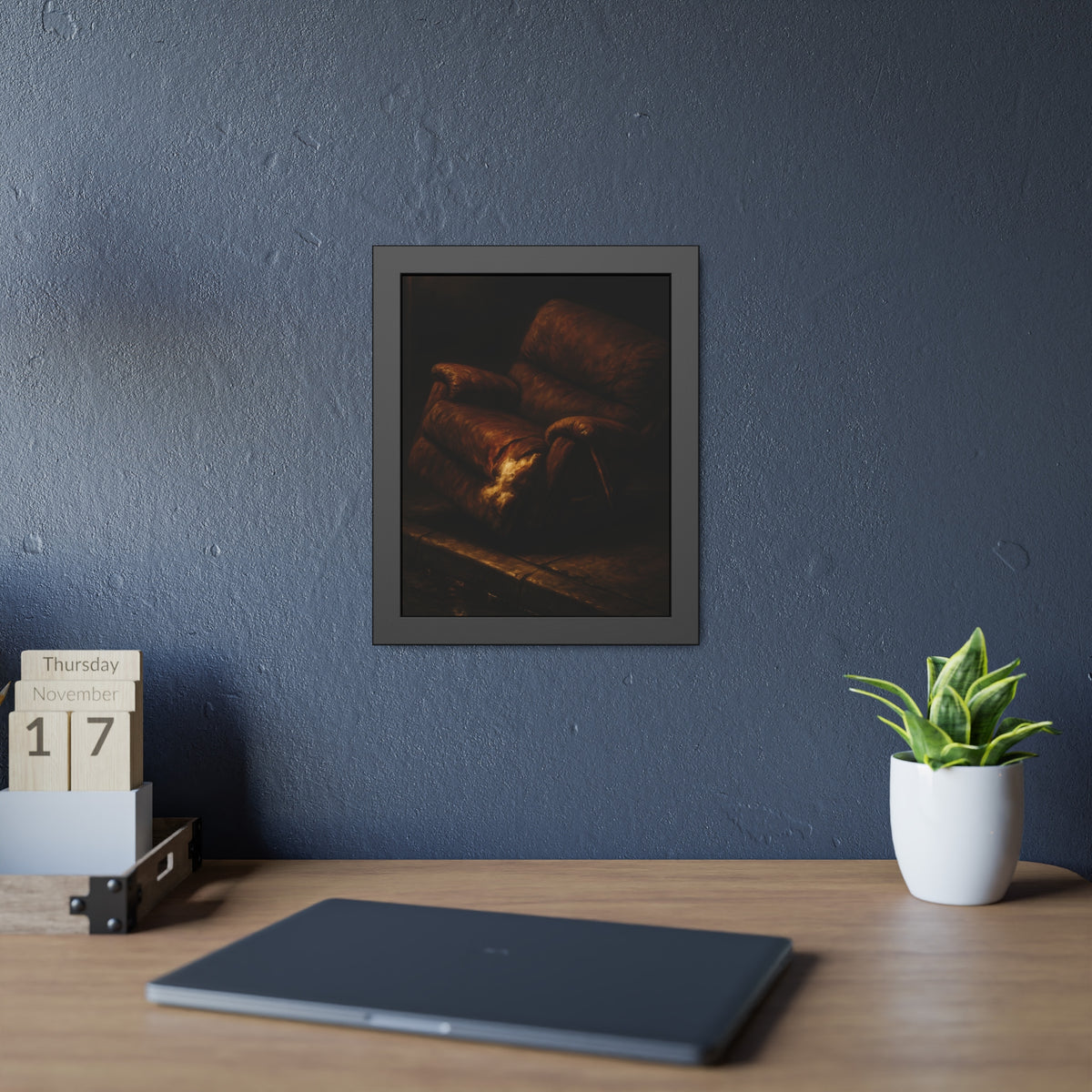 A torn brown recliner tipped on a curb in dim warm light. The Deposition of the Broken Recliner by Garabaggio, framed fine art print hanging in a room.