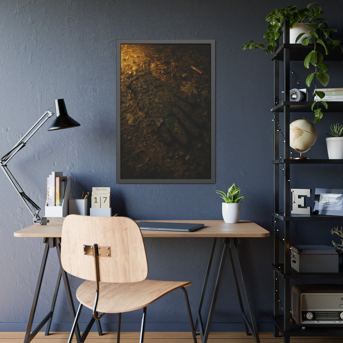 Wet mud and pressed oak leaves with a green scrap barely showing. The Reliquary of Mud and Leaf by Garabaggio, framed fine art print hanging in a room.