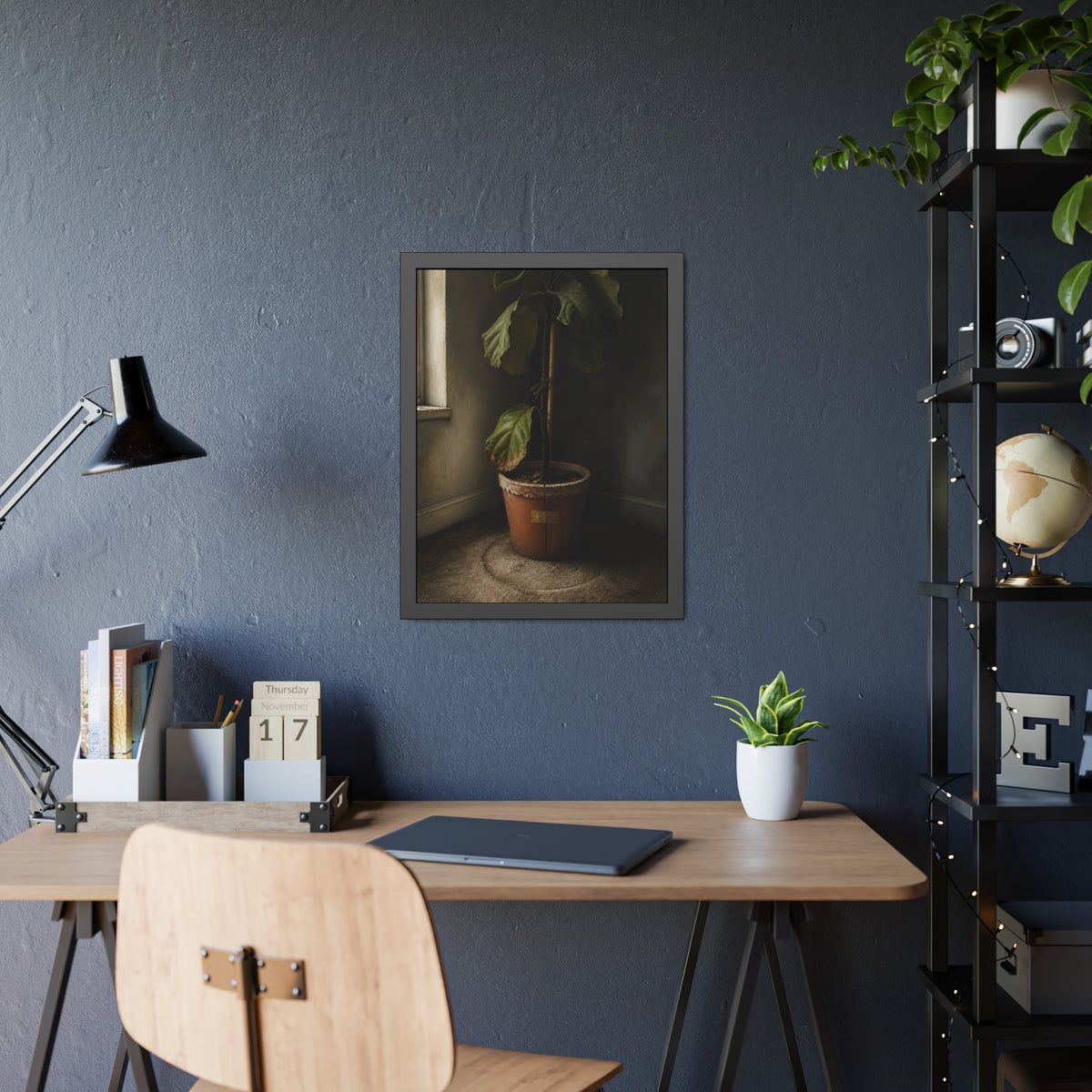 A leafy potted fig staked to a cane in a taped clay pot beside a window. The Corner by the Window by Garabaggio, framed fine art print hanging in a room.