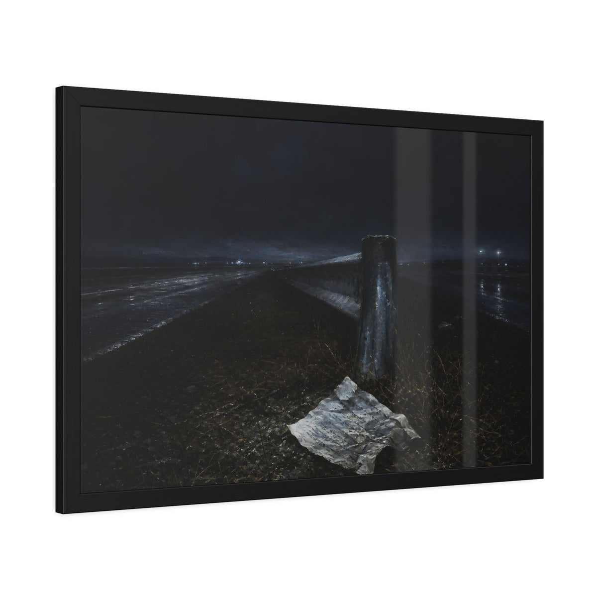 A sheet of paper on a grassy highway median beside a concrete post at night. The Resume on the Median by Garabaggio, framed fine art print hanging in a room.